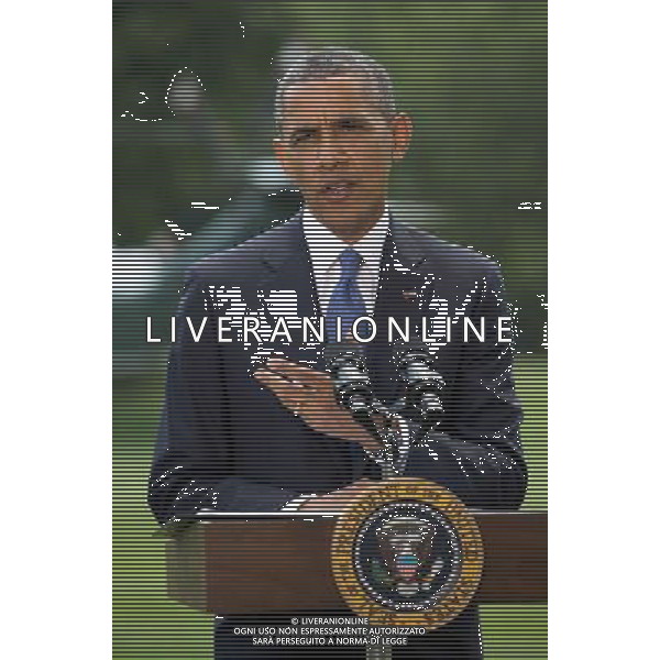 United States President Barack Obama makes a statement on the situation in Iraq prior to departing the South Lawn of the White House for a trip to North Dakota on Friday, June 13, 2014. In his remarks the President said \'We will not be sending US troops back into combat in Iraq,\' but said he has asked his national security team for a \'range of options that he will be reviewing in the days ahead.\' AG ALDO LIVERANI SAS ONLY ITALY