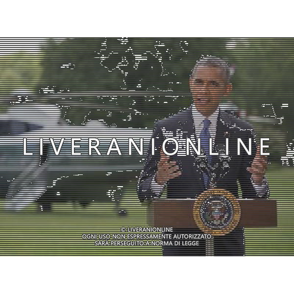 United States President Barack Obama makes a statement on the situation in Iraq prior to departing the South Lawn of the White House for a trip to North Dakota on Friday, June 13, 2014. In his remarks the President said \'We will not be sending US troops back into combat in Iraq,\' but said he has asked his national security team for a \'range of options that he will be reviewing in the days ahead.\' AG ALDO LIVERANI SAS ONLY ITALY