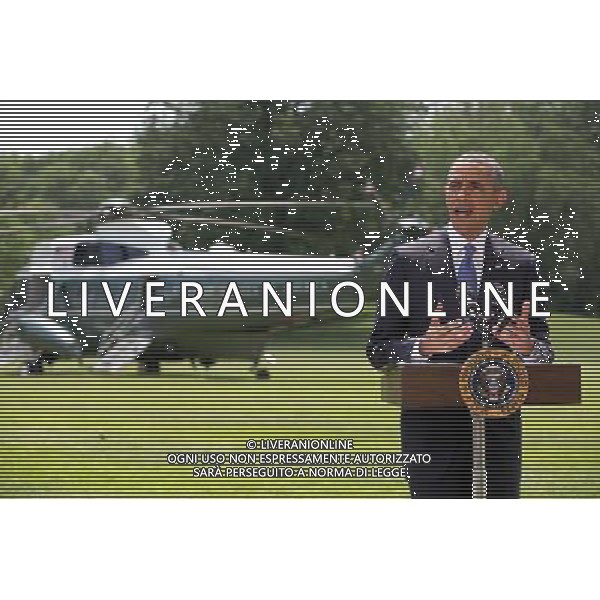 United States President Barack Obama makes a statement on the situation in Iraq prior to departing the South Lawn of the White House for a trip to North Dakota on Friday, June 13, 2014. In his remarks the President said \'We will not be sending US troops back into combat in Iraq,\' but said he has asked his national security team for a \'range of options that he will be reviewing in the days ahead.\' AG ALDO LIVERANI SAS ONLY ITALY