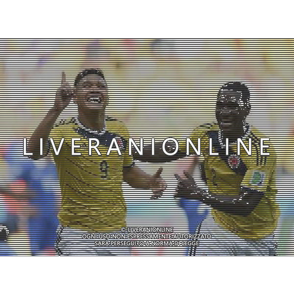 (140614) -- BELO HORIZONTE, June 14, 2014 () -- Colombia\'s Teofilo Gutierrez (L) celebrates Colombia\'s second goal during a Group C match between Colombia and Greece of 2014 FIFA World Cup in the Estadio Mineirao Stadium in Belo Horizonte, Brazil, June 14, 2014. (/Qi Heng) ©PHOTOSHOT/Agenzia Aldo Liverani Sas - ITALY ONLY - EDITORIAL USE ONLY - Colombia Vs Grecia partita del Gruppo C Coppa del Mondo FIFA 2014 Mineirao stadio Estadio a Belo Horizonte, in Brasile 14 Giugno 2014