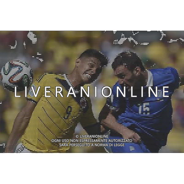 (140614) -- BELO HORIZONTE, June 14, 2014 () -- Colombia\'s Teofilo Gutierrez competes a headball with Greece\'s Vasilis Torosidis during a Group C match between Colombia and Greece of 2014 FIFA World Cup in the Estadio Mineirao Stadium in Belo Horizonte, Brazil, June 14, 2014. (/Qi Heng)(rh) ©PHOTOSHOT/Agenzia Aldo Liverani Sas - ITALY ONLY - EDITORIAL USE ONLY - Colombia Vs Grecia partita del Gruppo C Coppa del Mondo FIFA 2014 Mineirao stadio Estadio a Belo Horizonte, in Brasile 14 Giugno 2014