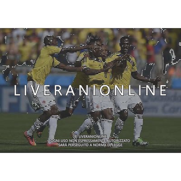 (140614) -- BELO HORIZONTE, June 14, 2014 () -- Colombia\'s players celebrate for the goal during a Group C match between Colombia and Greece of 2014 FIFA World Cup in the Estadio Mineirao Stadium in Belo Horizonte, Brazil, June 14, 2014. (/Qi Heng)(rh) ©PHOTOSHOT/Agenzia Aldo Liverani Sas - ITALY ONLY - EDITORIAL USE ONLY - Colombia Vs Grecia partita del Gruppo C Coppa del Mondo FIFA 2014 Mineirao stadio Estadio a Belo Horizonte, in Brasile 14 Giugno 2014