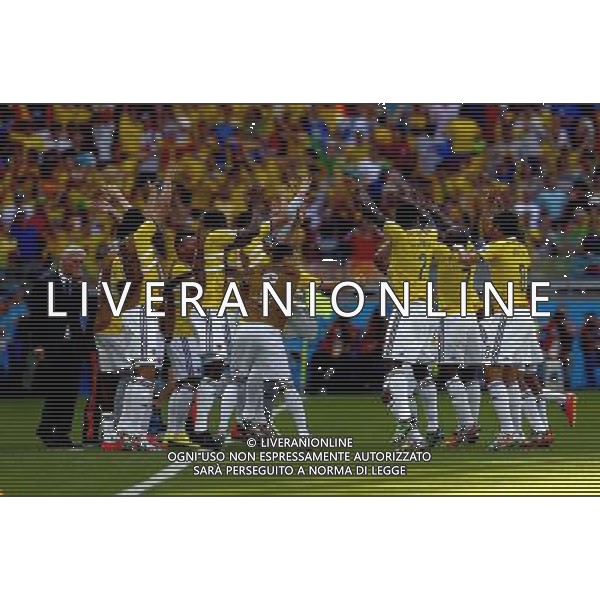 (140614) -- BELO HORIZONTE, June 14, 2014 () -- Colombia\'s players celebrate for No.7 Pablo Armero\'s goal during a Group C match between Colombia and Greece of 2014 FIFA World Cup at the Estadio Mineirao Stadium in Belo Horizonte, Brazil, June 14, 2014. (/Liu Bin)(pcy) ©PHOTOSHOT/Agenzia Aldo Liverani Sas - ITALY ONLY - EDITORIAL USE ONLY - Colombia Vs Grecia partita del Gruppo C Coppa del Mondo FIFA 2014 Mineirao stadio Estadio a Belo Horizonte, in Brasile 14 Giugno 2014