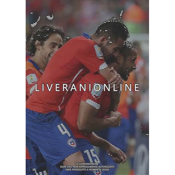 (140613) -- CUIABA, June 13, 2014 () -- Chile\'s players celebrate the third goal during a Group B match between Chile and Australia of 2014 FIFA World Cup in the Arena Pantanal Stadium in Cuiaba, Brazil, June 13, 2014. Chile won 3-1 over Australia on Friday. (/Li Ming)(rh) ©PHOTOSHOT/Agenzia Aldo Liverani sas - ITALY ONLY - EDITORIAL USE ONLY - Cile Vs Australia partita del Gruppo B Coppa del mondo FIFA World Cup nel Pantanal stadio Arena di Cuiaba, Brasile, 13 giugno 2014