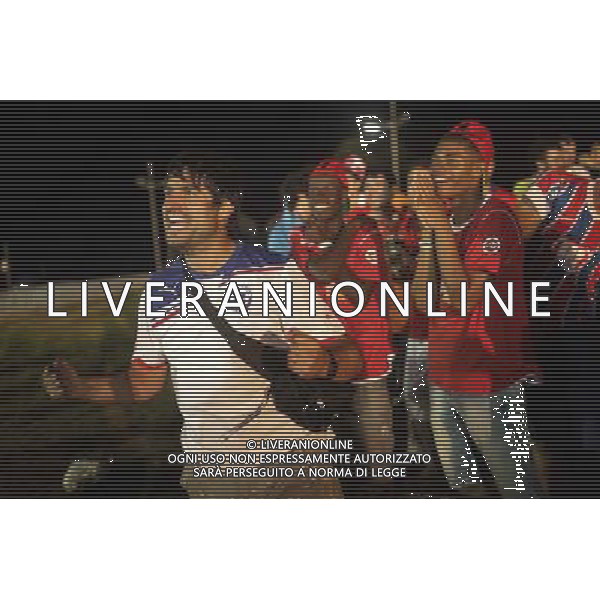 (140613) -- CUIABA, June 13, 2014 () -- Fans of chile cheer for a goal while watching a Group B match between Chile and Australia of 2014 FIFA World Cup in the Arena Pantanal Stadium in Cuiaba, Brazil, June 13, 2014. (/Jhon Paz)(rh) ©PHOTOSHOT/Agenzia Aldo Liverani sas - ITALY ONLY - EDITORIAL USE ONLY - Cile Vs Australia partita del Gruppo B Coppa del mondo FIFA World Cup nel Pantanal stadio Arena di Cuiaba, Brasile, 13 giugno 2014