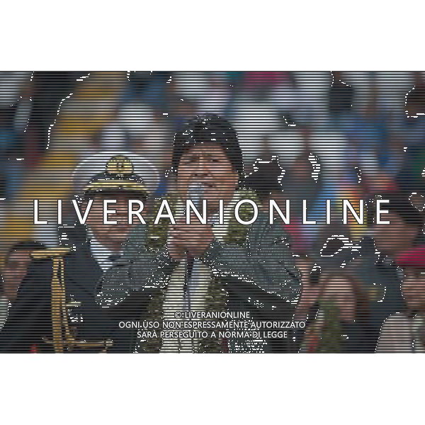 BO25 (140614) -- SANTA CRUZ, junio 14, 2014 (Xinhua) -- El presidente de Bolivia, Evo Morales, pronuncia un dicurso durante un evento previo a la apertura de la Cumbre G77+China, en el Estadio \'Ramón Tahiuchi Aguilera\', en Santa Cruz, Bolivia, el 14 de junio de 2014. El sábado se inaugura la Cumbre del G77+China que prevé aprobar un documento de más de 200 puntos, base de debate en la Organización de las Naciones Unidas (ONU) en 2015 para definir los próximos desafíos de desarrollo. (Xinhua/Pedro Mera) (pm) ©PHOTOSHOT/Agenzia Aldo Liverani sas - ITALY ONLY - EDITORIAL USE ONLY - Pre-apertura del vertice Cina + G77 a Santa Cruz, in Bolivia, il 14 giugno 2014 basato sulla discussione presso le Nazioni Unite (ONU) nel 2015 per definire le sfide di sviluppo successivi