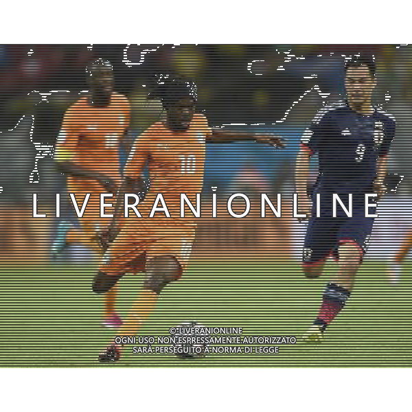 (140614) -- RECIFE, June 14, 2014 () -- Cote d\'Ivoire\'s Gervinho (C) runs with the ball during a Group C match between Cote d\'Ivoire and Japan of 2014 FIFA World Cup at the Arena Pernambuco Stadium in Recife, Brazil, June 14, 2014. (/Yang Lei)(pcy) ©PHOTOSHOT/Agenzia Aldo Liverani Sas - ITALY ONLY - EDITORIAL USE ONLY - Costa d\'Avorio Vs Giappone partita del Gruppo C della coppa del mondo 2014 FIFA World Cup Stadium Arena Pernambuco a Recife, in Brasile, 14 giugno 2014