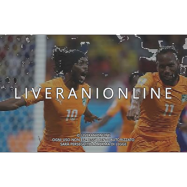 (140614) -- RECIFE, June 14, 2014 () -- Cote d\'Ivoire\'s Gervinho (L) and Didier Drogba celebrate the second goal during a Group C match between Cote d\'Ivoire and Japan of 2014 FIFA World Cup in the Aren Pernambuco Stadium in Recife, Brazil, June 14, 2014. (/Cao Can)(rh) ©PHOTOSHOT/Agenzia Aldo Liverani Sas - ITALY ONLY - EDITORIAL USE ONLY - Costa d\'Avorio Vs Giappone partita del Gruppo C della coppa del mondo 2014 FIFA World Cup Stadium Arena Pernambuco a Recife, in Brasile, 14 giugno 2014