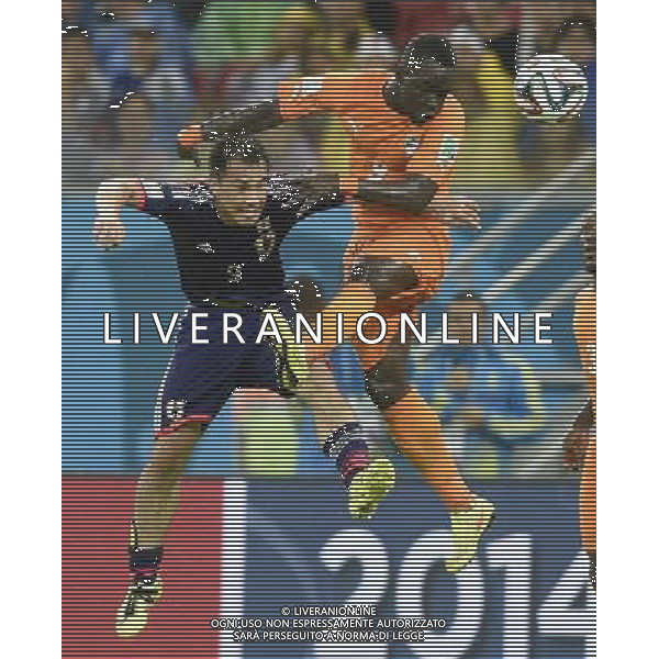 (140614) -- RECIFE, June 14, 2014 () -- Cote d\'Ivoire\'s Cheick Tiote (R) competes with Japan\'s Shinji Okazaki for a headball during a Group C match between Cote d\'Ivoire and Japan of 2014 FIFA World Cup at the Arena Pernambuco Stadium in Recife, Brazil, June 14, 2014. (/Yang Lei)(pcy) ©PHOTOSHOT/Agenzia Aldo Liverani Sas - ITALY ONLY - EDITORIAL USE ONLY - Costa d\'Avorio Vs Giappone partita del Gruppo C della coppa del mondo 2014 FIFA World Cup Stadium Arena Pernambuco a Recife, in Brasile, 14 giugno 2014