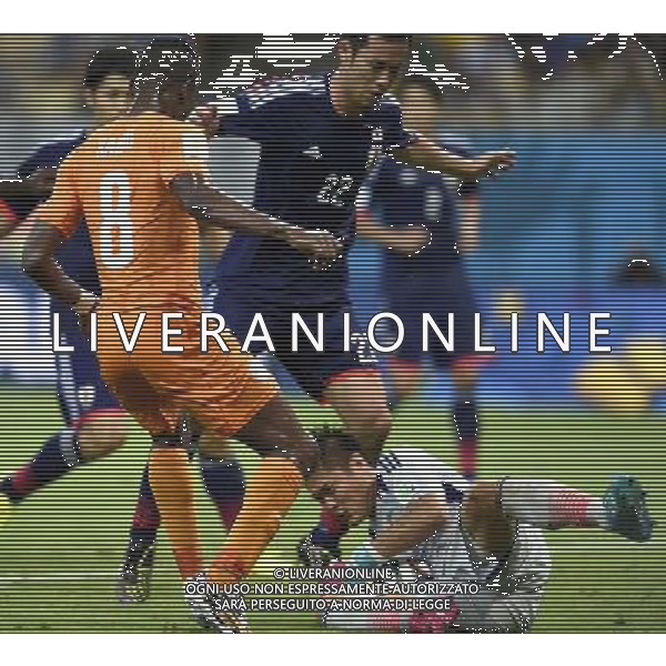 (140614) -- RECIFE, June 14, 2014 () -- Japan\'s goalkeeper Eiji Kawashima (down) grabs the ball during a Group C match between Cote d\'Ivoire and Japan of 2014 FIFA World Cup at the Arena Pernambuco Stadium in Recife, Brazil, June 14, 2014. (/Yang Lei)(pcy) ©PHOTOSHOT/Agenzia Aldo Liverani Sas - ITALY ONLY - EDITORIAL USE ONLY - Costa d\'Avorio Vs Giappone partita del Gruppo C della coppa del mondo 2014 FIFA World Cup Stadium Arena Pernambuco a Recife, in Brasile, 14 giugno 2014