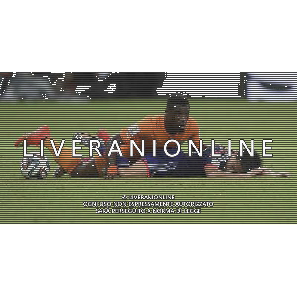 (140614) -- RECIFE, June 14, 2014 () -- Cote d\'Ivoire\'s Salomon Kalou (top) falls down in a competition with Japan\'s Shinji Kagawa during a Group C match between Cote d\'Ivoire and Japan of 2014 FIFA World Cup at the Arena Pernambuco Stadium in Recife, Brazil, June 14, 2014. (/Yang Lei)(pcy) ©PHOTOSHOT/Agenzia Aldo Liverani Sas - ITALY ONLY - EDITORIAL USE ONLY - Costa d\'Avorio Vs Giappone partita del Gruppo C della coppa del mondo 2014 FIFA World Cup Stadium Arena Pernambuco a Recife, in Brasile, 14 giugno 2014