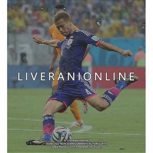 (140614) -- RECIFE, June 14, 2014 () -- Japan\'s Keisuke Honda scores a goal during a Group C match between Cote d\'Ivoire and Japan of 2014 FIFA World Cup in the Aren Pernambuco Stadium in Recife, Brazil, June 14, 2014. (/Cao Can)(rh) ©PHOTOSHOT/Agenzia Aldo Liverani Sas - ITALY ONLY - EDITORIAL USE ONLY - Costa d\'Avorio Vs Giappone partita del Gruppo C della coppa del mondo 2014 FIFA World Cup Stadium Arena Pernambuco a Recife, in Brasile, 14 giugno 2014