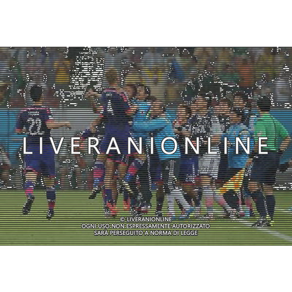 (140614) -- RECIFE, June 14, 2014 () -- Japan\'s players celebrate No. 4 Keisuke Honda\'s goal during a Group C match between Cote d\'Ivoire and Japan of 2014 FIFA World Cup in the Aren Pernambuco Stadium in Recife, Brazil, June 14, 2014. (/Cao Can)(rh) ©PHOTOSHOT/Agenzia Aldo Liverani Sas - ITALY ONLY - EDITORIAL USE ONLY - Costa d\'Avorio Vs Giappone partita del Gruppo C della coppa del mondo 2014 FIFA World Cup Stadium Arena Pernambuco a Recife, in Brasile, 14 giugno 2014