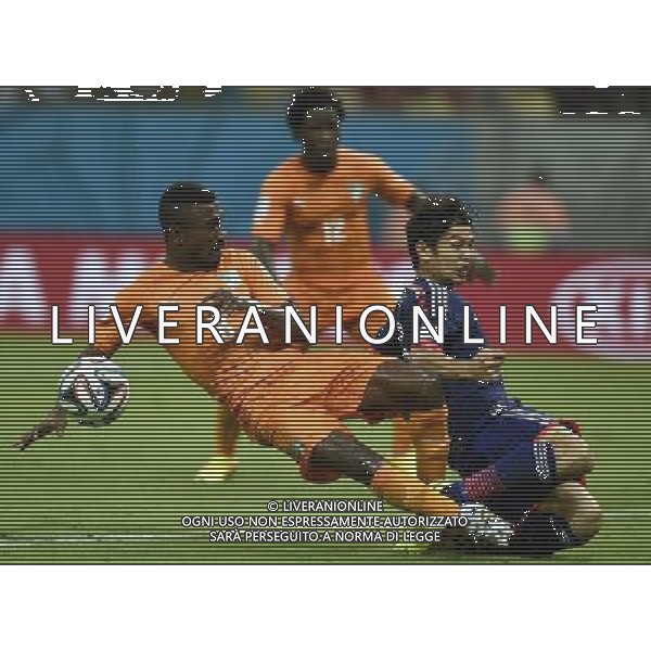 (140614) -- RECIFE, June 14, 2014 () -- Japan\'s Masato Morishige defends against Cote d\'Ivoire\'s Salomon Kalou during a Group C match between Cote d\'Ivoire and Japan of 2014 FIFA World Cup at the Arena Pernambuco Stadium in Recife, Brazil, June 14, 2014. (/Yang Lei)(pcy) ©PHOTOSHOT/Agenzia Aldo Liverani Sas - ITALY ONLY - EDITORIAL USE ONLY - Costa d\'Avorio Vs Giappone partita del Gruppo C della coppa del mondo 2014 FIFA World Cup Stadium Arena Pernambuco a Recife, in Brasile, 14 giugno 2014