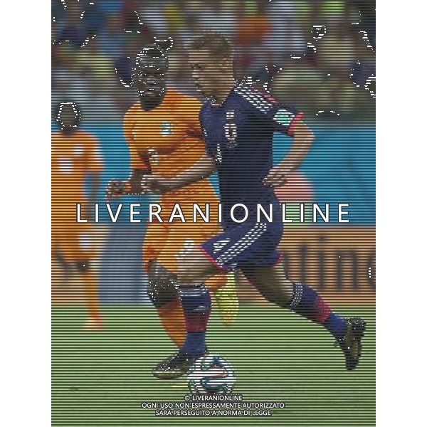 (140614) -- RECIFE, June 14, 2014 () -- Japan\'s Keisuke Honda runs with the ball during a Group C match between Cote d\'Ivoire and Japan of 2014 FIFA World Cup in the Aren Pernambuco Stadium in Recife, Brazil, June 14, 2014. (/Cao Can)(rh) ©PHOTOSHOT/Agenzia Aldo Liverani Sas - ITALY ONLY - EDITORIAL USE ONLY - Costa d\'Avorio Vs Giappone partita del Gruppo C della coppa del mondo 2014 FIFA World Cup Stadium Arena Pernambuco a Recife, in Brasile, 14 giugno 2014