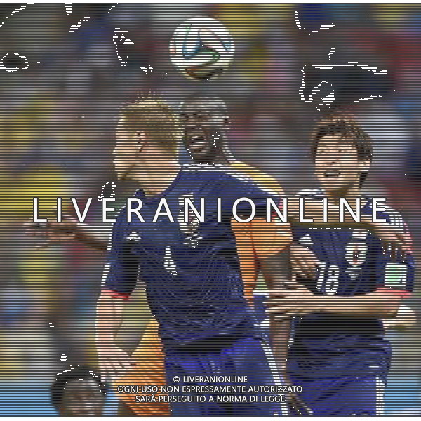 (140614) -- RECIFE, June 14, 2014 () -- Japan\'s Keisuke Honda (front) competes for a headball during a Group C match between Cote d\'Ivoire and Japan of 2014 FIFA World Cup at the Arena Pernambuco Stadium in Recife, Brazil, June 14, 2014. (/Yang Lei)(pcy) ©PHOTOSHOT/Agenzia Aldo Liverani Sas - ITALY ONLY - EDITORIAL USE ONLY - Costa d\'Avorio Vs Giappone partita del Gruppo C della coppa del mondo 2014 FIFA World Cup Stadium Arena Pernambuco a Recife, in Brasile, 14 giugno 2014