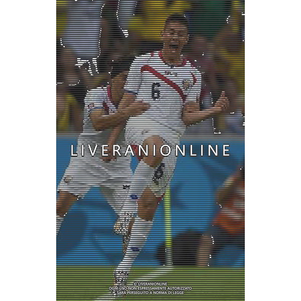 (140614) -- FORTALEZA, June 14, 2014 () -- Costa Rica\'s Oscar Duarte (R) celebrates his goal during a Group D match between Uruguay and Costa Rica of 2014 FIFA World Cup at the Estadio Castelao Stadium in Fortaleza, Brazil, June 14, 2014. (/Lui Siu Wai)(pcy) ©PHOTOSHOT/Agenzia Aldo Liverani sas - ITALY ONLY - EDITORIAL USE ONLY - Uruguay vs Costa Rica partita del Gruppo D della Coppa del mondo FIFA 2014 Castelao stadio Estadio a Fortaleza, in Brasile, 14 Giugno 2014