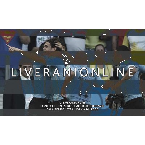 (140614) -- FORTALEZA, June 14, 2014 () -- Uruguay\'s Edinson Cavani (2nd L) celebrates for a penalty goal during a Group D match between Uruguay and Costa Rica of 2014 FIFA World Cup in the Estadio Castelao Stadium in Fortaleza, Brazil, June 14, 2014. (/Guo Yong)(rh) ©PHOTOSHOT/Agenzia Aldo Liverani sas - ITALY ONLY - EDITORIAL USE ONLY - Uruguay vs Costa Rica partita del Gruppo D della Coppa del mondo FIFA 2014 Castelao stadio Estadio a Fortaleza, in Brasile, 14 Giugno 2014