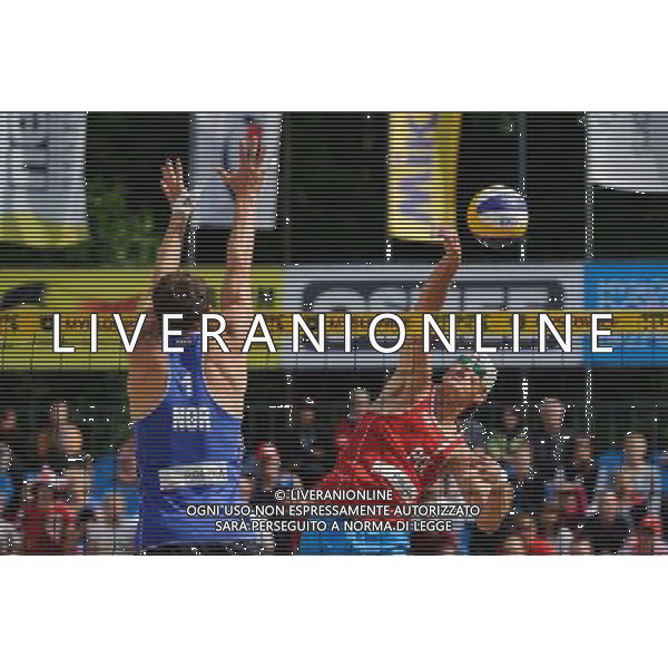 15.06.2014 , Myslowice , Slupna , siatkowka plazowa , Mistrzostwa Swiata U23 , Kosiak , Rudol (czerwone) Tvinde , Mol (niebieskie) N/Z Hendrik Mol , Maciej Rudol Fot. Karol Bartnik / MPAimages.com / Newspix.pl --- Newspix.pl World Championships in beach volleyball U23 AG ALDO LIVERANI SAS ONLY ITALY *** Local Caption *** www.newspix.pl mail us: info@newspix.pl call us: 0048 022 23 22 222 --- Polish Picture Agency by Ringier Axel Springer Poland
