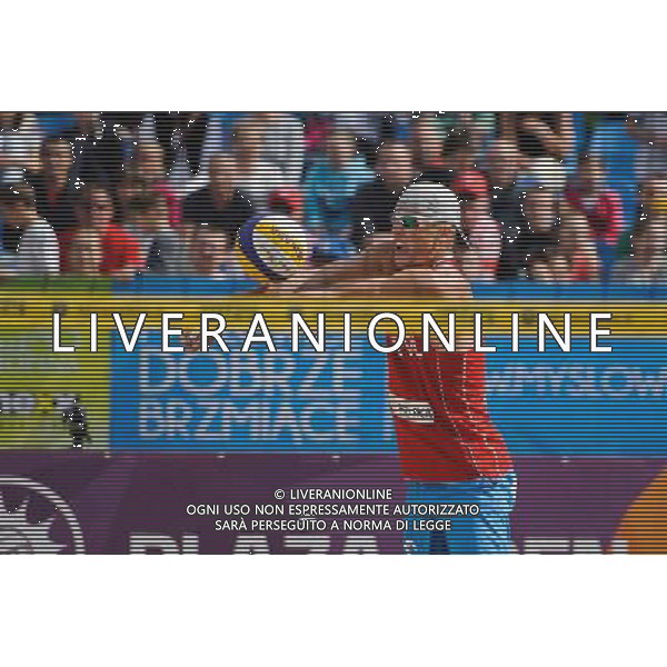 15.06.2014 , Myslowice , Slupna , siatkowka plazowa , Mistrzostwa Swiata U23 , Kosiak , Rudol (czerwone) Tvinde , Mol (niebieskie) N/Z Maciej Rudol Fot. Karol Bartnik / MPAimages.com / Newspix.pl --- Newspix.pl World Championships in beach volleyball U23 AG ALDO LIVERANI SAS ONLY ITALY *** Local Caption *** www.newspix.pl mail us: info@newspix.pl call us: 0048 022 23 22 222 --- Polish Picture Agency by Ringier Axel Springer Poland