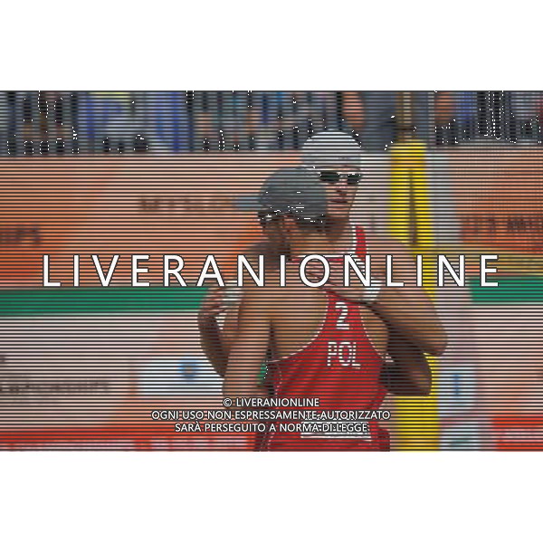 15.06.2014 , Myslowice , Slupna , siatkowka plazowa , Mistrzostwa Swiata U23 , Kosiak , Rudol (czerwone) Tvinde , Mol (niebieskie) N/Z Maciej Kosiak , Maciej Rudol Fot. Karol Bartnik / MPAimages.com / Newspix.pl --- Newspix.pl World Championships in beach volleyball U23 AG ALDO LIVERANI SAS ONLY ITALY *** Local Caption *** www.newspix.pl mail us: info@newspix.pl call us: 0048 022 23 22 222 --- Polish Picture Agency by Ringier Axel Springer Poland