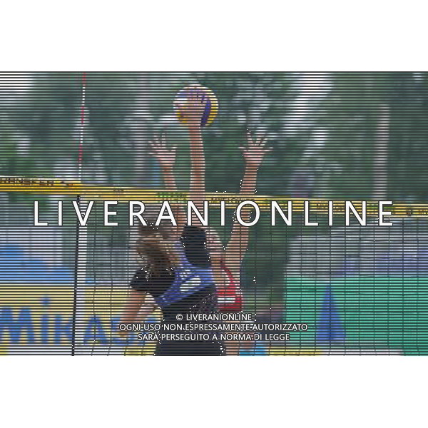15.06.2014 , Myslowice , Slupna , siatkowka plazowa , Mistrzostwa Swiata U23 , Humana Paredes , Pischke (czerwone) Lahti , Parkkinen (niebieskie) N/Z Anniina Parkkinen , Taylor Pischke Fot. Karol Bartnik / MPAimages.com / Newspix.pl --- Newspix.pl World Championships in beach volleyball U23 AG ALDO LIVERANI SAS ONLY ITALY *** Local Caption *** www.newspix.pl mail us: info@newspix.pl call us: 0048 022 23 22 222 --- Polish Picture Agency by Ringier Axel Springer Poland