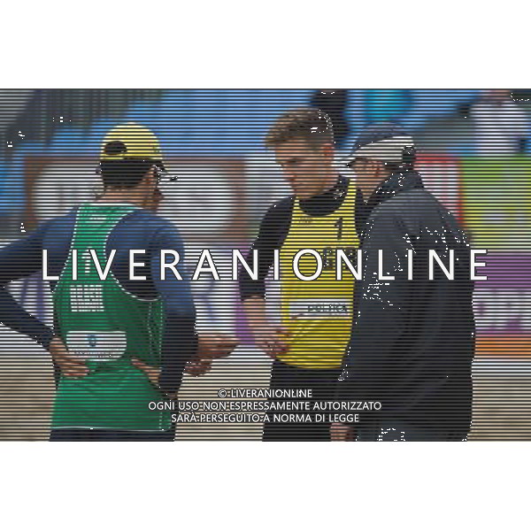 15.06.2014 , Myslowice , Slupna , siatkowka plazowa , Mistrzostwa Swiata U23 , Alliso , Guto (zielone) Poniewaz , Poniewaz (zolte) N/Z Allison , Bennet Poniewaz Fot. Karol Bartnik / MPAimages.com / Newspix.pl --- Newspix.pl World Championships in beach volleyball U23 AG ALDO LIVERANI SAS ONLY ITALY *** Local Caption *** www.newspix.pl mail us: info@newspix.pl call us: 0048 022 23 22 222 --- Polish Picture Agency by Ringier Axel Springer Poland