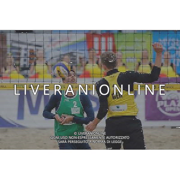 15.06.2014 , Myslowice , Slupna , siatkowka plazowa , Mistrzostwa Swiata U23 , Alliso , Guto (zielone) Poniewaz , Poniewaz (zolte) N/Z Gustavo Carvalhaes , Bennet Poniewaz Fot. Karol Bartnik / MPAimages.com / Newspix.pl --- Newspix.pl World Championships in beach volleyball U23 AG ALDO LIVERANI SAS ONLY ITALY *** Local Caption *** www.newspix.pl mail us: info@newspix.pl call us: 0048 022 23 22 222 --- Polish Picture Agency by Ringier Axel Springer Poland