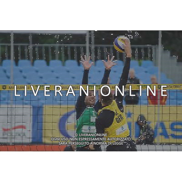 15.06.2014 , Myslowice , Slupna , siatkowka plazowa , Mistrzostwa Swiata U23 , Alliso , Guto (zielone) Poniewaz , Poniewaz (zolte) N/Z Gustavo Carvalhaes , David Poniewaz Fot. Karol Bartnik / MPAimages.com / Newspix.pl --- Newspix.pl World Championships in beach volleyball U23 AG ALDO LIVERANI SAS ONLY ITALY *** Local Caption *** www.newspix.pl mail us: info@newspix.pl call us: 0048 022 23 22 222 --- Polish Picture Agency by Ringier Axel Springer Poland