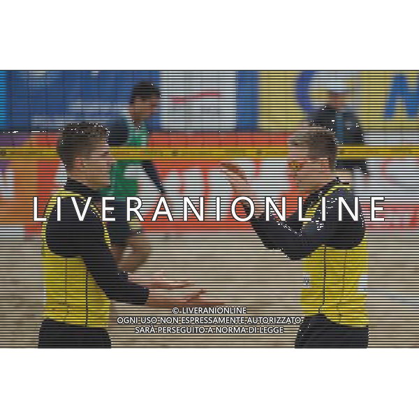 15.06.2014 , Myslowice , Slupna , siatkowka plazowa , Mistrzostwa Swiata U23 , Alliso , Guto (zielone) Poniewaz , Poniewaz (zolte) N/Z Bennet Poniewaz , David Poniewaz Fot. Karol Bartnik / MPAimages.com / Newspix.pl --- Newspix.pl World Championships in beach volleyball U23 AG ALDO LIVERANI SAS ONLY ITALY *** Local Caption *** www.newspix.pl mail us: info@newspix.pl call us: 0048 022 23 22 222 --- Polish Picture Agency by Ringier Axel Springer Poland