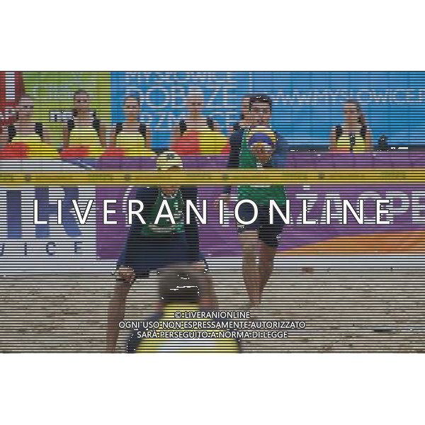15.06.2014 , Myslowice , Slupna , siatkowka plazowa , Mistrzostwa Swiata U23 , Alliso , Guto (zielone) Poniewaz , Poniewaz (zolte) N/Z Allison , Gustavo Carvalhaes Fot. Karol Bartnik / MPAimages.com / Newspix.pl --- Newspix.pl World Championships in beach volleyball U23 AG ALDO LIVERANI SAS ONLY ITALY *** Local Caption *** www.newspix.pl mail us: info@newspix.pl call us: 0048 022 23 22 222 --- Polish Picture Agency by Ringier Axel Springer Poland