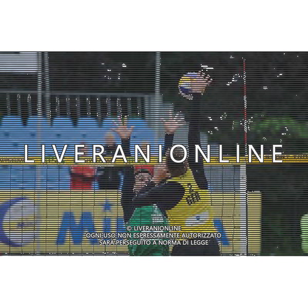15.06.2014 , Myslowice , Slupna , siatkowka plazowa , Mistrzostwa Swiata U23 , Alliso , Guto (zielone) Poniewaz , Poniewaz (zolte) N/Z Gustavo Carvalhaes , David Poniewaz Fot. Karol Bartnik / MPAimages.com / Newspix.pl --- Newspix.pl World Championships in beach volleyball U23 AG ALDO LIVERANI SAS ONLY ITALY *** Local Caption *** www.newspix.pl mail us: info@newspix.pl call us: 0048 022 23 22 222 --- Polish Picture Agency by Ringier Axel Springer Poland