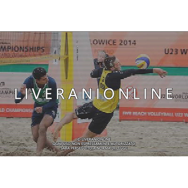15.06.2014 , Myslowice , Slupna , siatkowka plazowa , Mistrzostwa Swiata U23 , Alliso , Guto (zielone) Poniewaz , Poniewaz (zolte) N/Z Gustavo Carvalhaes , David Poniewaz Fot. Karol Bartnik / MPAimages.com / Newspix.pl --- Newspix.pl World Championships in beach volleyball U23 AG ALDO LIVERANI SAS ONLY ITALY *** Local Caption *** www.newspix.pl mail us: info@newspix.pl call us: 0048 022 23 22 222 --- Polish Picture Agency by Ringier Axel Springer Poland