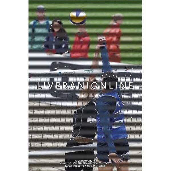 14.06.2014 , Myslowice , Slupna , siatkowka plazowa , Mistrzostwa Swiata U23 , Poniewaz , Poniewaz (czarne) Saymon , Marcus (niebieskie) N/Z Bennet Poniewaz , Marcus Carvalhaes Fot. Karol Bartnik / MPAimages.com / Newspix.pl --- Newspix.pl World Championships in beach volleyball U23 AG ALDO LIVERANI SAS ONLY ITALY *** Local Caption *** www.newspix.pl mail us: info@newspix.pl call us: 0048 022 23 22 222 --- Polish Picture Agency by Ringier Axel Springer Poland