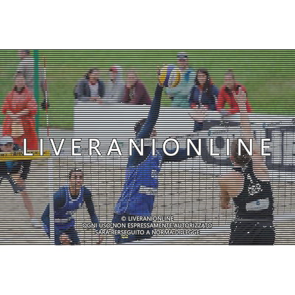 14.06.2014 , Myslowice , Slupna , siatkowka plazowa , Mistrzostwa Swiata U23 , Poniewaz , Poniewaz (czarne) Saymon , Marcus (niebieskie) N/Z Marcus Carvalhaes , Bennet Poniewaz Fot. Karol Bartnik / MPAimages.com / Newspix.pl --- Newspix.pl World Championships in beach volleyball U23 AG ALDO LIVERANI SAS ONLY ITALY *** Local Caption *** www.newspix.pl mail us: info@newspix.pl call us: 0048 022 23 22 222 --- Polish Picture Agency by Ringier Axel Springer Poland
