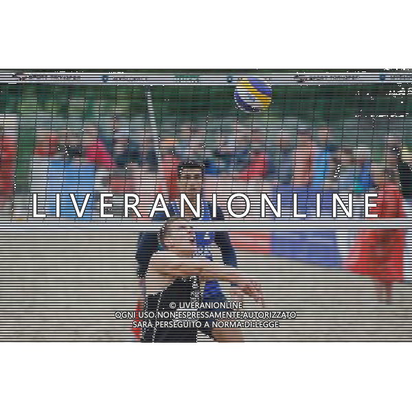 14.06.2014 , Myslowice , Slupna , siatkowka plazowa , Mistrzostwa Swiata U23 , Poniewaz , Poniewaz (czarne) Saymon , Marcus (niebieskie) N/Z David Poniewaz Fot. Karol Bartnik / MPAimages.com / Newspix.pl --- Newspix.pl World Championships in beach volleyball U23 AG ALDO LIVERANI SAS ONLY ITALY *** Local Caption *** www.newspix.pl mail us: info@newspix.pl call us: 0048 022 23 22 222 --- Polish Picture Agency by Ringier Axel Springer Poland