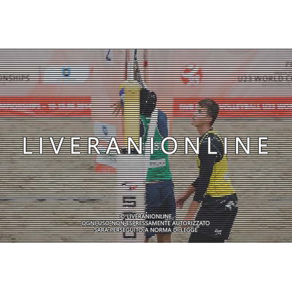 14.06.2014 , Myslowice , Slupna , siatkowka plazowa , Mistrzostwa Swiata U23 , Losiak , Bryl (zolte) Alliso , Guto Carvalhaes (zielone) N/Z Allison , Michal Bryl Fot. Karol Bartnik / MPAimages.com / Newspix.pl --- Newspix.pl World Championships in beach volleyball U23 AG ALDO LIVERANI SAS ONLY ITALY *** Local Caption *** www.newspix.pl mail us: info@newspix.pl call us: 0048 022 23 22 222 --- Polish Picture Agency by Ringier Axel Springer Poland