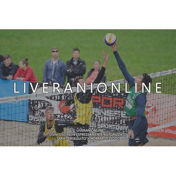 14.06.2014 , Myslowice , Slupna , siatkowka plazowa , Mistrzostwa Swiata U23 , Losiak , Bryl (zolte) Alliso , Guto Carvalhaes (zielone) N/Z Bartosz Losiak , Michal Bryl , Allison Fot. Karol Bartnik / MPAimages.com / Newspix.pl --- Newspix.pl World Championships in beach volleyball U23 AG ALDO LIVERANI SAS ONLY ITALY *** Local Caption *** www.newspix.pl mail us: info@newspix.pl call us: 0048 022 23 22 222 --- Polish Picture Agency by Ringier Axel Springer Poland