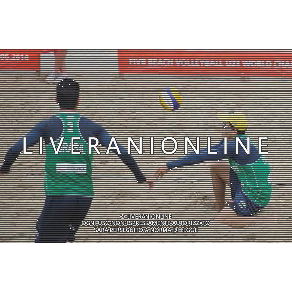 14.06.2014 , Myslowice , Slupna , siatkowka plazowa , Mistrzostwa Swiata U23 , Losiak , Bryl (zolte) Alliso , Guto Carvalhaes (zielone) N/Z Allison , Gustavo Carvalhaes Fot. Karol Bartnik / MPAimages.com / Newspix.pl --- Newspix.pl World Championships in beach volleyball U23 AG ALDO LIVERANI SAS ONLY ITALY *** Local Caption *** www.newspix.pl mail us: info@newspix.pl call us: 0048 022 23 22 222 --- Polish Picture Agency by Ringier Axel Springer Poland