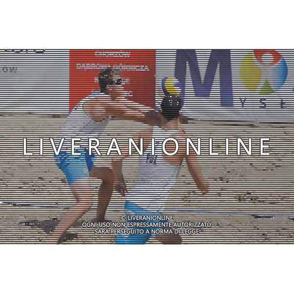 14.06.2014 , Myslowice , Slupna , siatkowka plazowa , Mistrzostwa Swiata U23 , Haralds , Armands (niebieskie) Losiak , Bryl (biale) N/Z Michal Bryl , Bartosz Losiak Fot. Karol Bartnik / MPAimages.com / Newspix.pl --- Newspix.pl World Championships in beach volleyball U23 AG ALDO LIVERANI SAS ONLY ITALY *** Local Caption *** www.newspix.pl mail us: info@newspix.pl call us: 0048 022 23 22 222 --- Polish Picture Agency by Ringier Axel Springer Poland