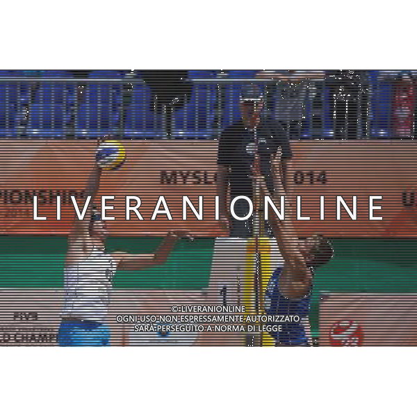 14.06.2014 , Myslowice , Slupna , siatkowka plazowa , Mistrzostwa Swiata U23 , Haralds , Armands (niebieskie) Losiak , Bryl (biale) N/Z Michal Bryl , Haralds Regza Fot. Karol Bartnik / MPAimages.com / Newspix.pl --- Newspix.pl World Championships in beach volleyball U23 AG ALDO LIVERANI SAS ONLY ITALY *** Local Caption *** www.newspix.pl mail us: info@newspix.pl call us: 0048 022 23 22 222 --- Polish Picture Agency by Ringier Axel Springer Poland