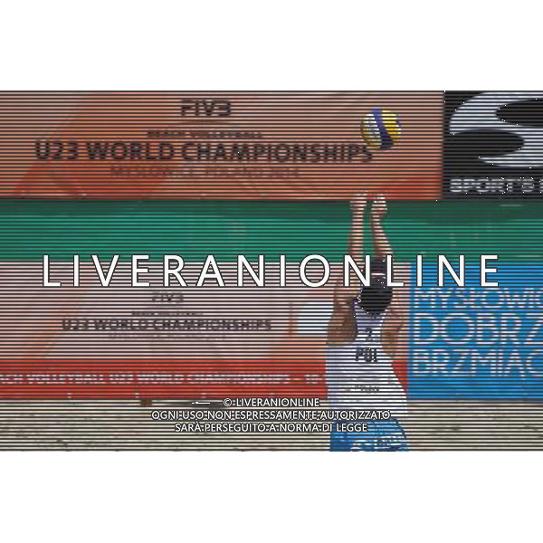 14.06.2014 , Myslowice , Slupna , siatkowka plazowa , Mistrzostwa Swiata U23 , Haralds , Armands (niebieskie) Losiak , Bryl (biale) N/Z Bartosz Losiak Fot. Karol Bartnik / MPAimages.com / Newspix.pl --- Newspix.pl World Championships in beach volleyball U23 AG ALDO LIVERANI SAS ONLY ITALY *** Local Caption *** www.newspix.pl mail us: info@newspix.pl call us: 0048 022 23 22 222 --- Polish Picture Agency by Ringier Axel Springer Poland