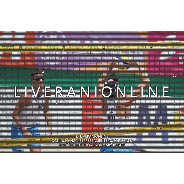 14.06.2014 , Myslowice , Slupna , siatkowka plazowa , Mistrzostwa Swiata U23 , Haralds , Armands (niebieskie) Losiak , Bryl (biale) N/Z Michal Bryl , Bartosz Losiak Fot. Karol Bartnik / MPAimages.com / Newspix.pl --- Newspix.pl World Championships in beach volleyball U23 AG ALDO LIVERANI SAS ONLY ITALY *** Local Caption *** www.newspix.pl mail us: info@newspix.pl call us: 0048 022 23 22 222 --- Polish Picture Agency by Ringier Axel Springer Poland