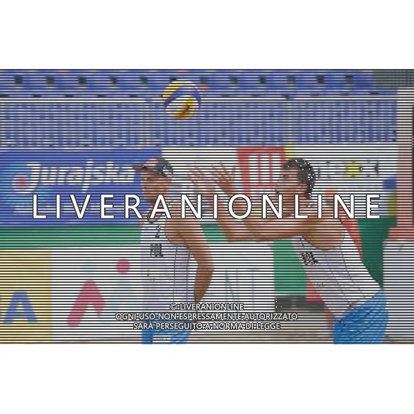 14.06.2014 , Myslowice , Slupna , siatkowka plazowa , Mistrzostwa Swiata U23 , Haralds , Armands (niebieskie) Losiak , Bryl (biale) N/Z Bartosz Losiak , Michal Bryl Fot. Karol Bartnik / MPAimages.com / Newspix.pl --- Newspix.pl World Championships in beach volleyball U23 AG ALDO LIVERANI SAS ONLY ITALY *** Local Caption *** www.newspix.pl mail us: info@newspix.pl call us: 0048 022 23 22 222 --- Polish Picture Agency by Ringier Axel Springer Poland