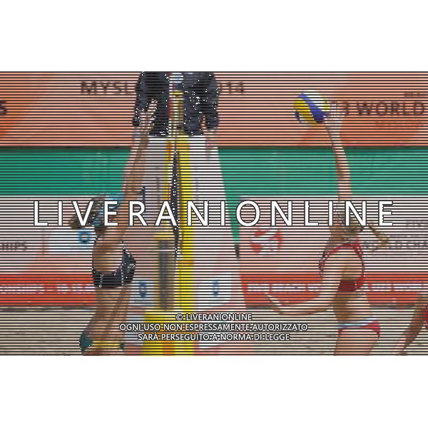 14.06.2014 , Myslowice , Slupna , siatkowka plazowa , Mistrzostwa Swiata U23 , Larid , Artacho (czarne) Hughes , Woolever (czerwone) N/Z Nicole Laird , Sara Hughes Fot. Karol Bartnik / MPAimages.com / Newspix.pl --- Newspix.pl World Championships in beach volleyball U23 AG ALDO LIVERANI SAS ONLY ITALY *** Local Caption *** www.newspix.pl mail us: info@newspix.pl call us: 0048 022 23 22 222 --- Polish Picture Agency by Ringier Axel Springer Poland