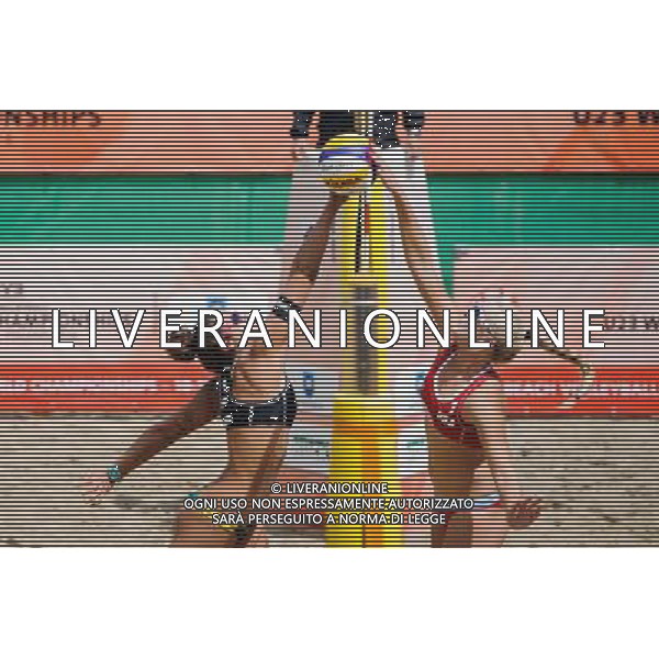 14.06.2014 , Myslowice , Slupna , siatkowka plazowa , Mistrzostwa Swiata U23 , Larid , Artacho (czarne) Hughes , Woolever (czerwone) N/Z Mariafe Artacho , Sara Hughes Fot. Karol Bartnik / MPAimages.com / Newspix.pl --- Newspix.pl World Championships in beach volleyball U23 AG ALDO LIVERANI SAS ONLY ITALY *** Local Caption *** www.newspix.pl mail us: info@newspix.pl call us: 0048 022 23 22 222 --- Polish Picture Agency by Ringier Axel Springer Poland