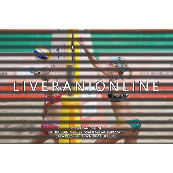 14.06.2014 , Myslowice , Slupna , siatkowka plazowa , Mistrzostwa Swiata U23 , Larid , Artacho (czarne) Hughes , Woolever (czerwone) N/Z Sara Hughes , Nicole Laird Fot. Karol Bartnik / MPAimages.com / Newspix.pl --- Newspix.pl World Championships in beach volleyball U23 AG ALDO LIVERANI SAS ONLY ITALY *** Local Caption *** www.newspix.pl mail us: info@newspix.pl call us: 0048 022 23 22 222 --- Polish Picture Agency by Ringier Axel Springer Poland