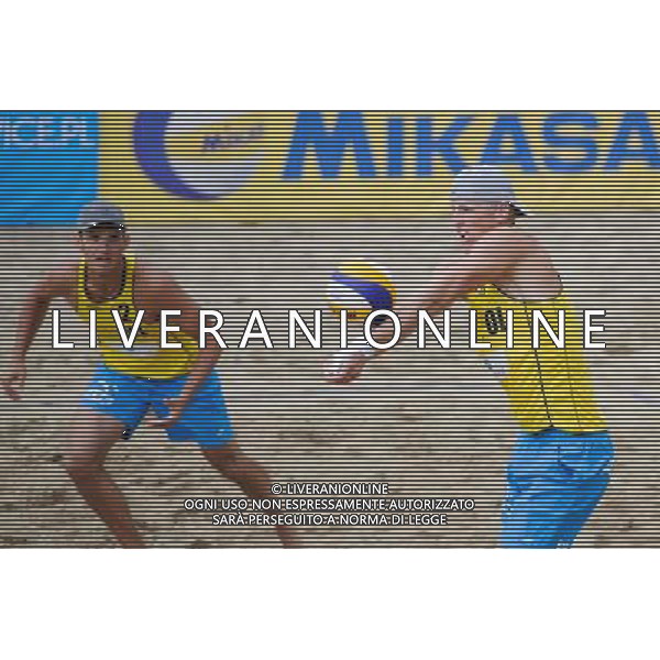 14.06.2014 , Myslowice , Slupna , siatkowka plazowa , Mistrzostwa Swiata U23 , Buivids , Reinis (czerwone) Kosiak , Rudol (zolte) N/Z Maciej Kosiak , Maciej Rudol Fot. Karol Bartnik / MPAimages.com / Newspix.pl --- Newspix.pl World Championships in beach volleyball U23 AG ALDO LIVERANI SAS ONLY ITALY *** Local Caption *** www.newspix.pl mail us: info@newspix.pl call us: 0048 022 23 22 222 --- Polish Picture Agency by Ringier Axel Springer Poland
