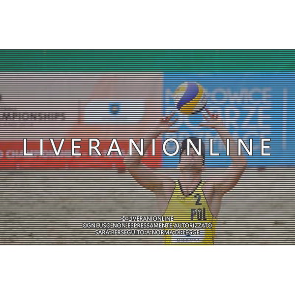 14.06.2014 , Myslowice , Slupna , siatkowka plazowa , Mistrzostwa Swiata U23 , Buivids , Reinis (czerwone) Kosiak , Rudol (zolte) N/Z Maciej Kosiak Fot. Karol Bartnik / MPAimages.com / Newspix.pl --- Newspix.pl World Championships in beach volleyball U23 AG ALDO LIVERANI SAS ONLY ITALY *** Local Caption *** www.newspix.pl mail us: info@newspix.pl call us: 0048 022 23 22 222 --- Polish Picture Agency by Ringier Axel Springer Poland