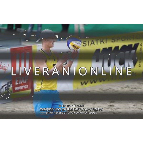 14.06.2014 , Myslowice , Slupna , siatkowka plazowa , Mistrzostwa Swiata U23 , Buivids , Reinis (czerwone) Kosiak , Rudol (zolte) N/Z Maciej Rudol Fot. Karol Bartnik / MPAimages.com / Newspix.pl --- Newspix.pl World Championships in beach volleyball U23 AG ALDO LIVERANI SAS ONLY ITALY *** Local Caption *** www.newspix.pl mail us: info@newspix.pl call us: 0048 022 23 22 222 --- Polish Picture Agency by Ringier Axel Springer Poland